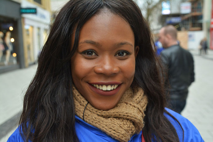a woman smiling with good facial skin